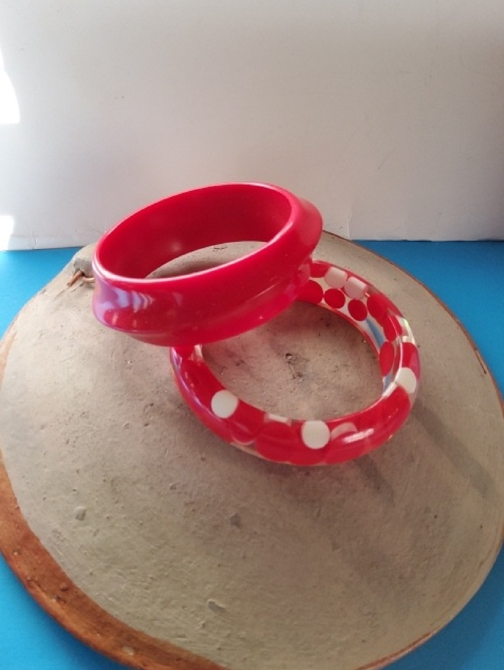Vintage Lucite Polka-dot/solid Red Bangles.